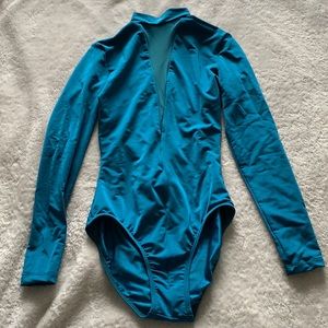 teal leotard with mesh front and open back